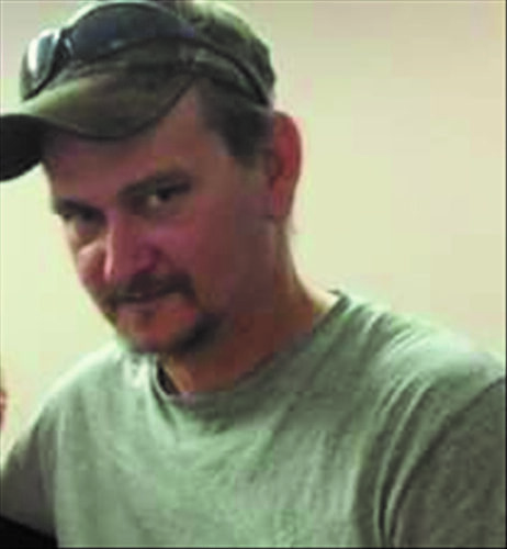 John C.  Hostetler